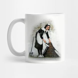 Banksy sweeping it under the carpet Mug